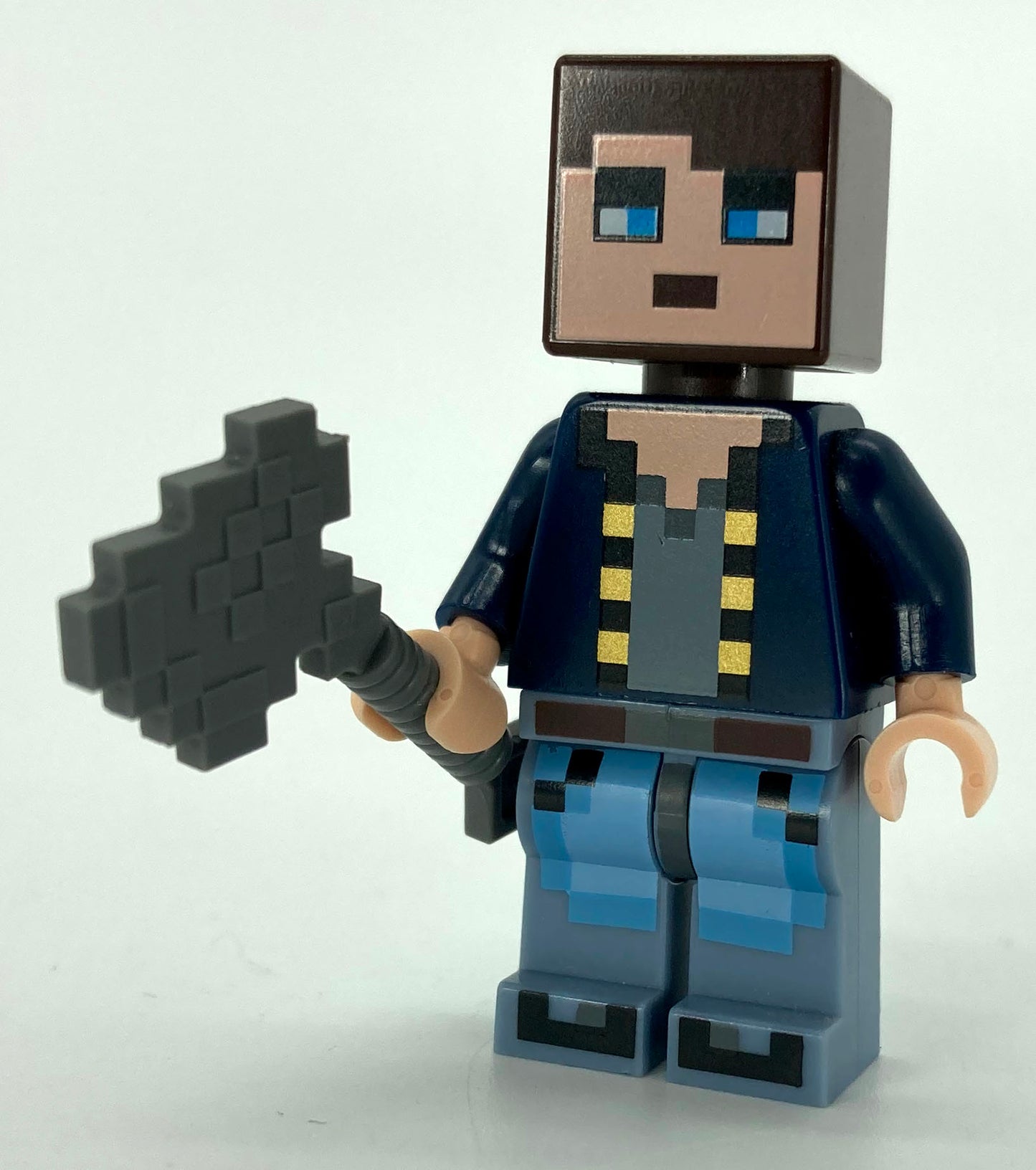 Minecraft Skin 8 - Pixelated, Dark Blue Jacket and Bright Light Blue and Sand Blue Legs